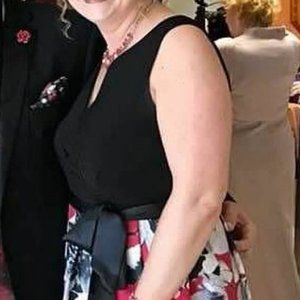 Floral patterned- red, white & black, formal dress - with pockets -worn once